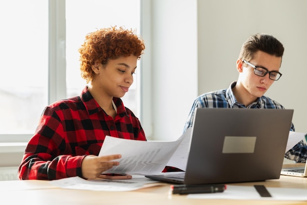 Strategic planning workspace with financial models and scenario analysis